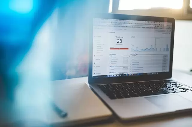 laptop showing analytics of website visitors